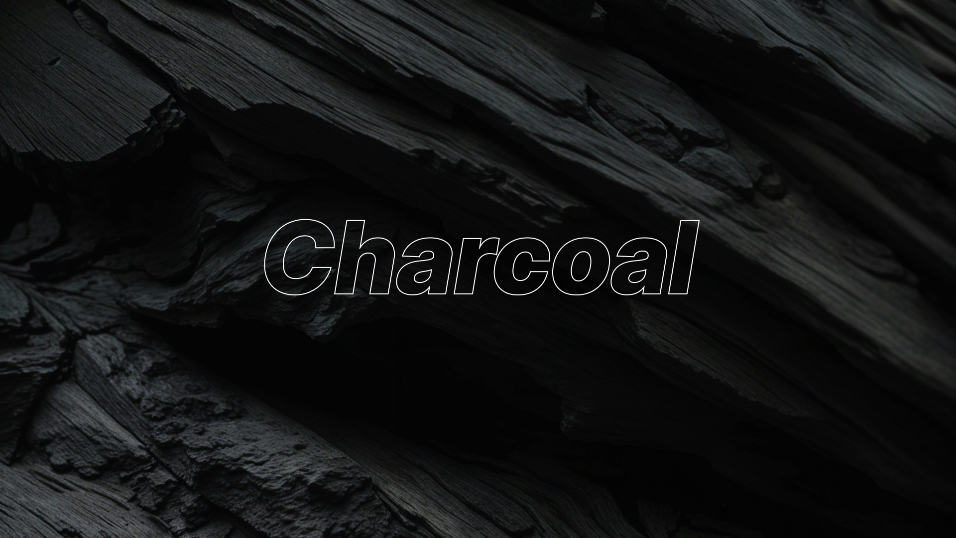 Charcoal Design System hero: dark monochromatic background with the Charcoal wordmark
